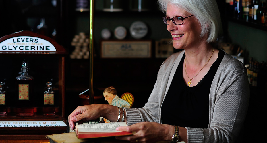 Academic in old fashioned chemist
